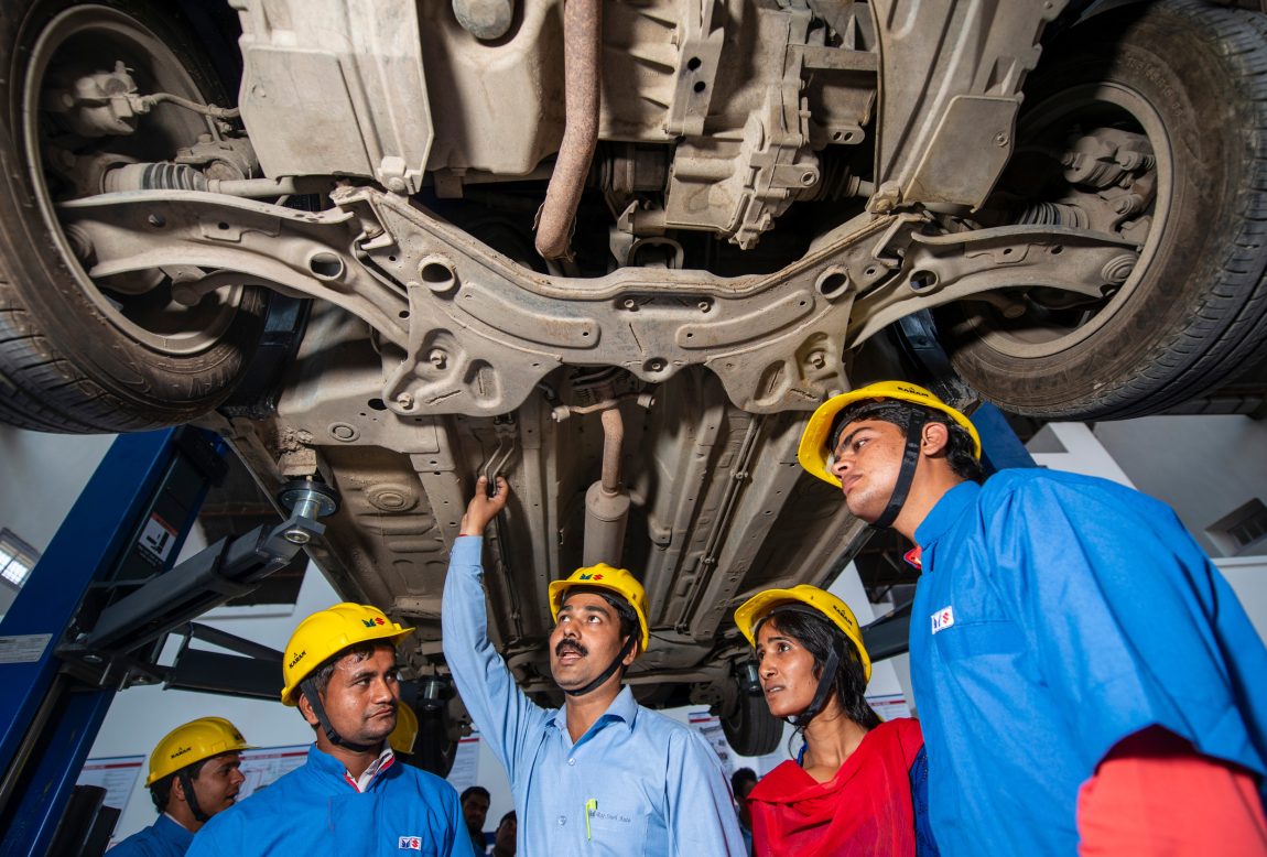 stock-photo-meerut-uttar-pradesh-india-april-student-in-auto-repairing-training-class-at-2154042675.jpeg